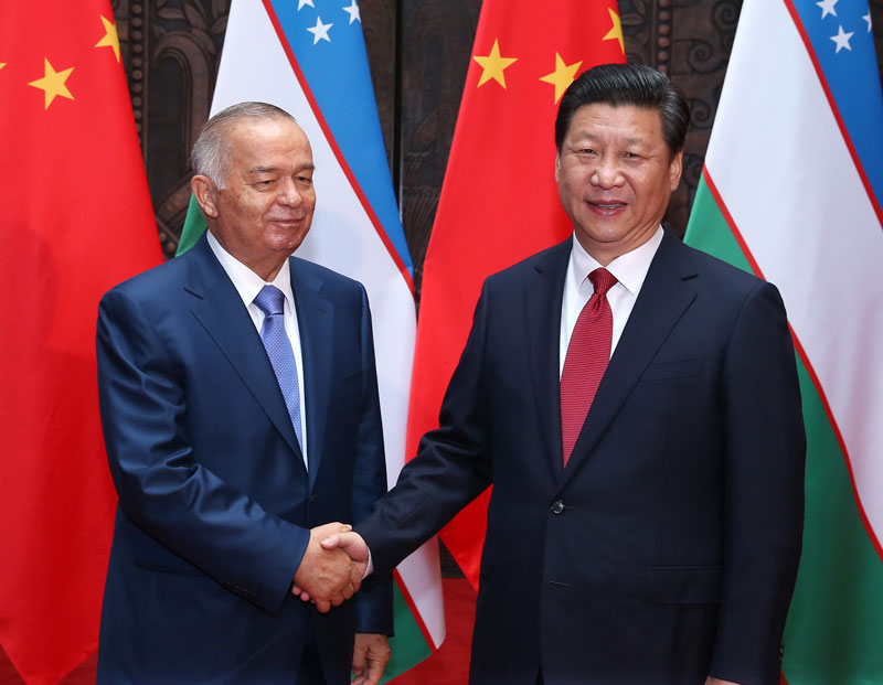 5月20日，國家主席習近平在上海會見烏茲別克斯坦總統卡裡莫夫。新華社記者 龐興雷 攝