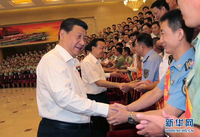 2014年6月27日，習(xí)近平、李克強(qiáng)、張高麗等在北京接見第五次全國邊海防工作會(huì)議全體與會(huì)代表。 李剛 攝