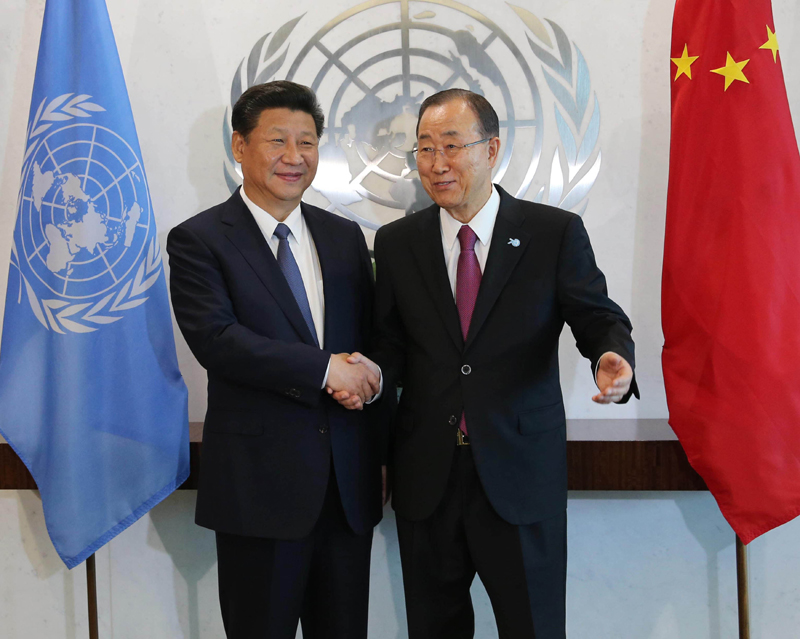 9月26日，國家主席習近平在紐約聯合國總部會見聯合國秘書長潘基文。新華社記者 劉衛兵 攝