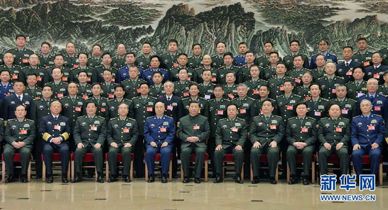 中央軍委改革工作會議2015年11月24日至26日在京舉行。習近平出席會議並發表重要講話。這是習近平親切接見會議代表，同大家合影留念。記者李剛攝