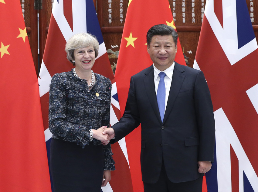 9月5日，國家主席習近平在杭州會見來華出席二十國集團領導人峰會的英國首相特雷莎·梅。新華社記者 龐興雷攝