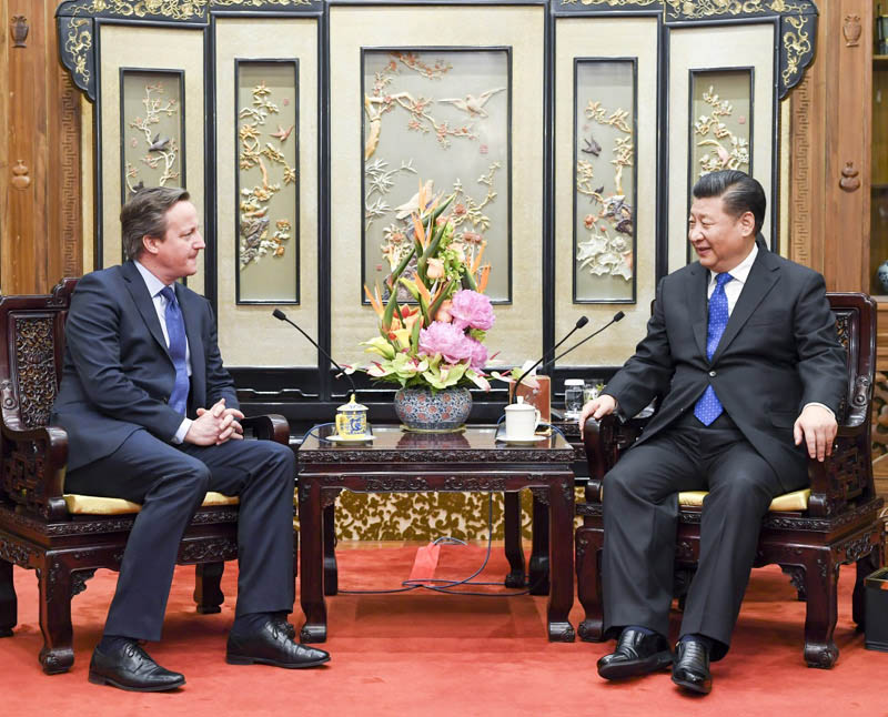 1月11日，國家主席習近平在北京釣魚臺國賓館會見英國前首相卡梅倫。新華社記者李學仁攝