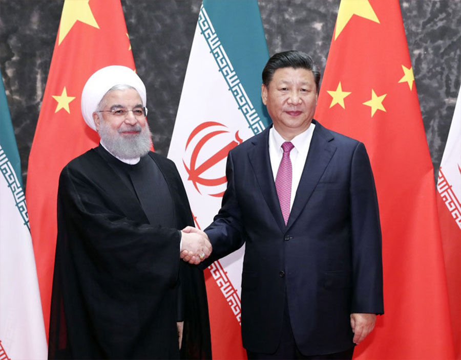 6月10日，國家主席習(xí)近平在青島同伊朗總統(tǒng)魯哈尼舉行會談。新華社記者 丁林 攝