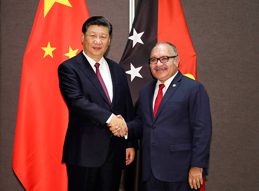 11月16日，國家主席習近平在莫爾茲比港同巴布亞新幾內亞總理奧尼爾會談。 新華社記者 丁林 攝