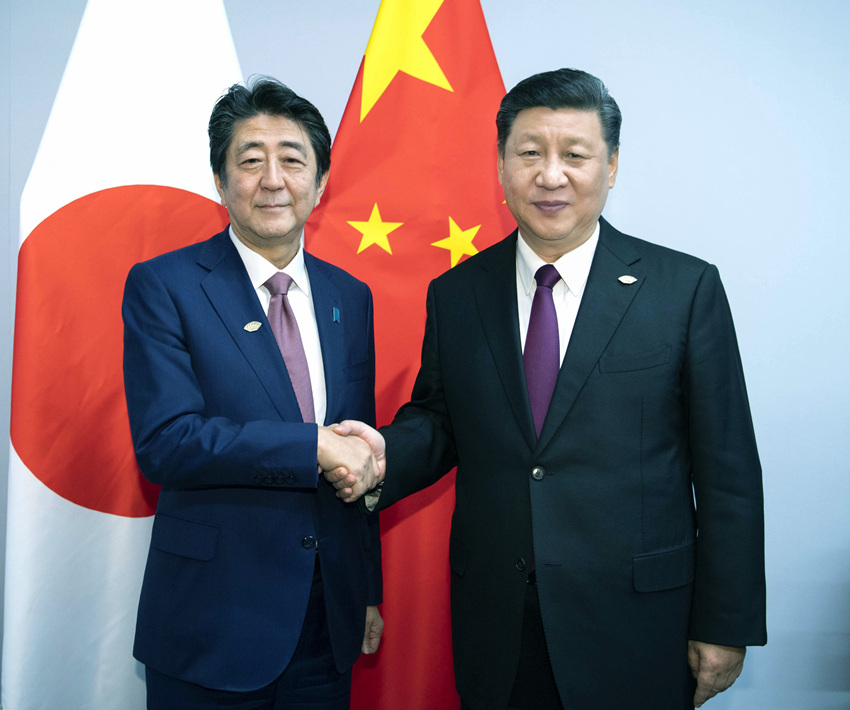當地時間11月30日，國家主席習近平在布宜諾斯艾利斯會見日本首相安倍晉三。 新華社記者 李濤 攝