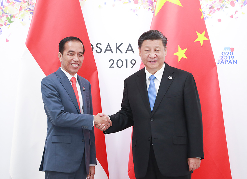 6月28日，國(guó)家主席習(xí)近平在大阪會(huì)見印度尼西亞總統(tǒng)佐科。 新華社記者 龐興雷 攝